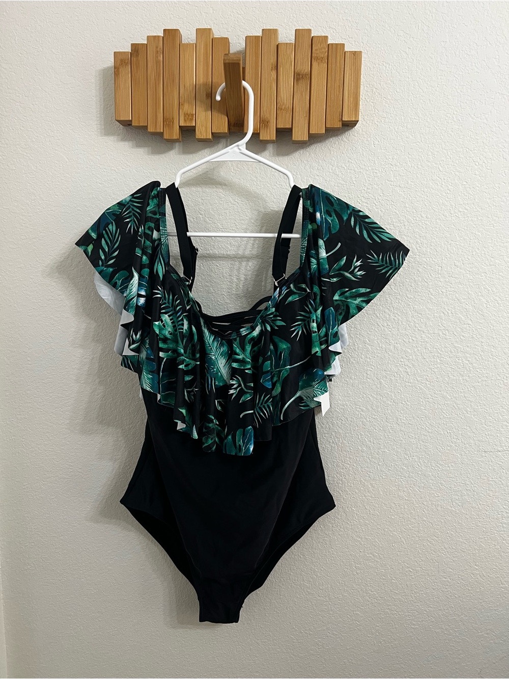 Black One-Piece Swimsuit with Green Leaf Ruffle